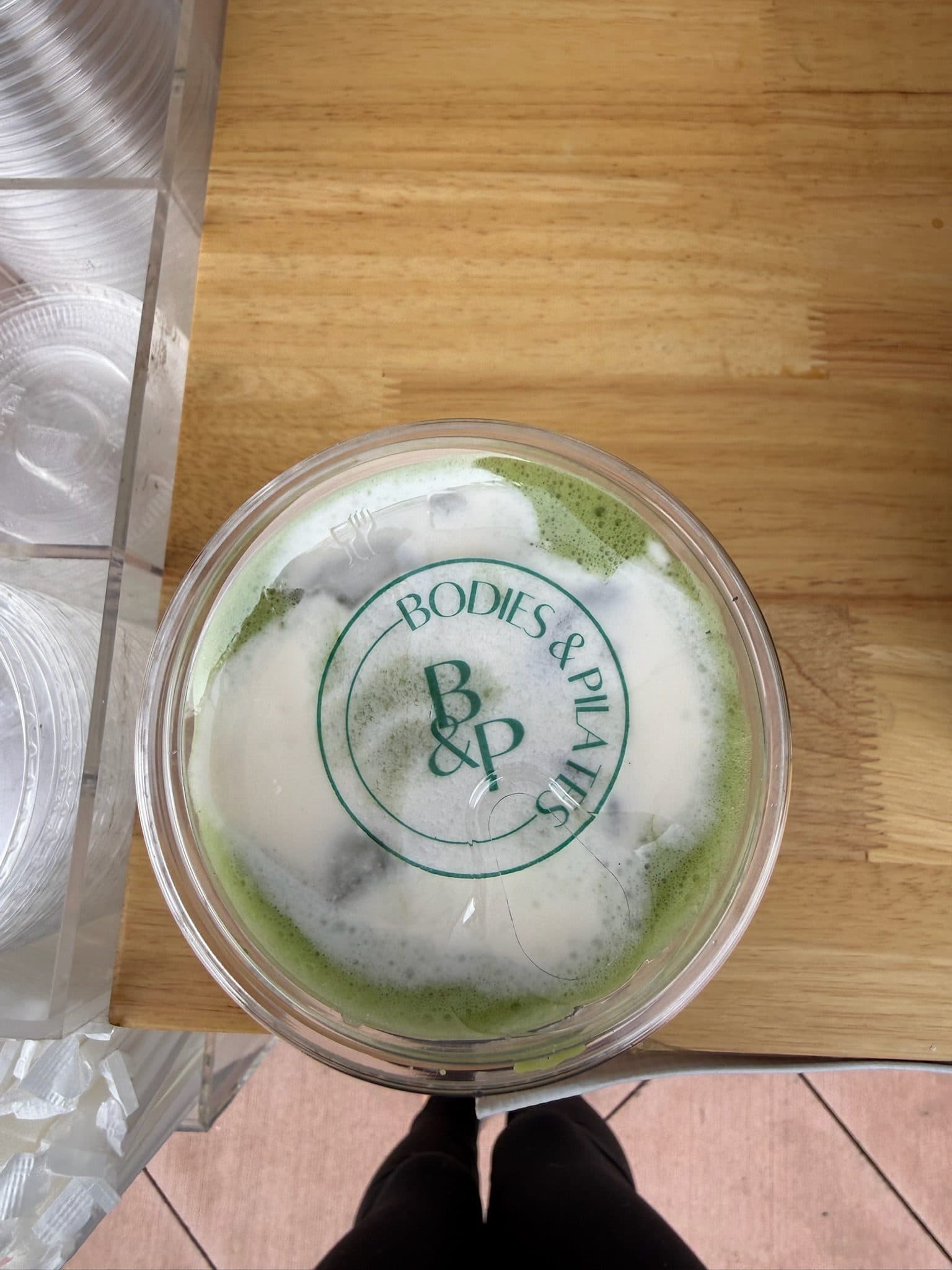 Matcha in a Bodies and Pilates branded cup