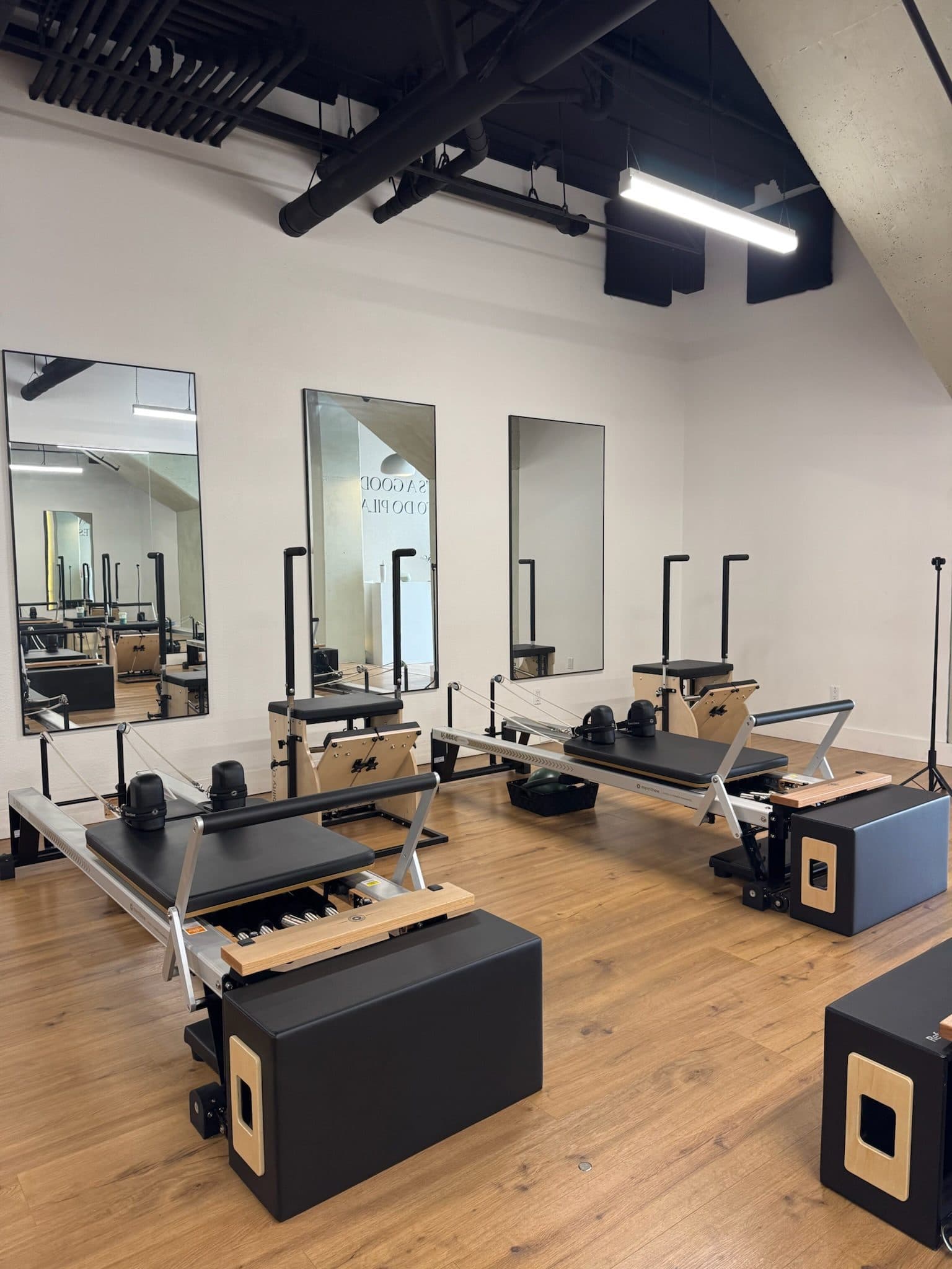 Reformers with sitting boxes set up at Bodies and Pilates in North Hollywood